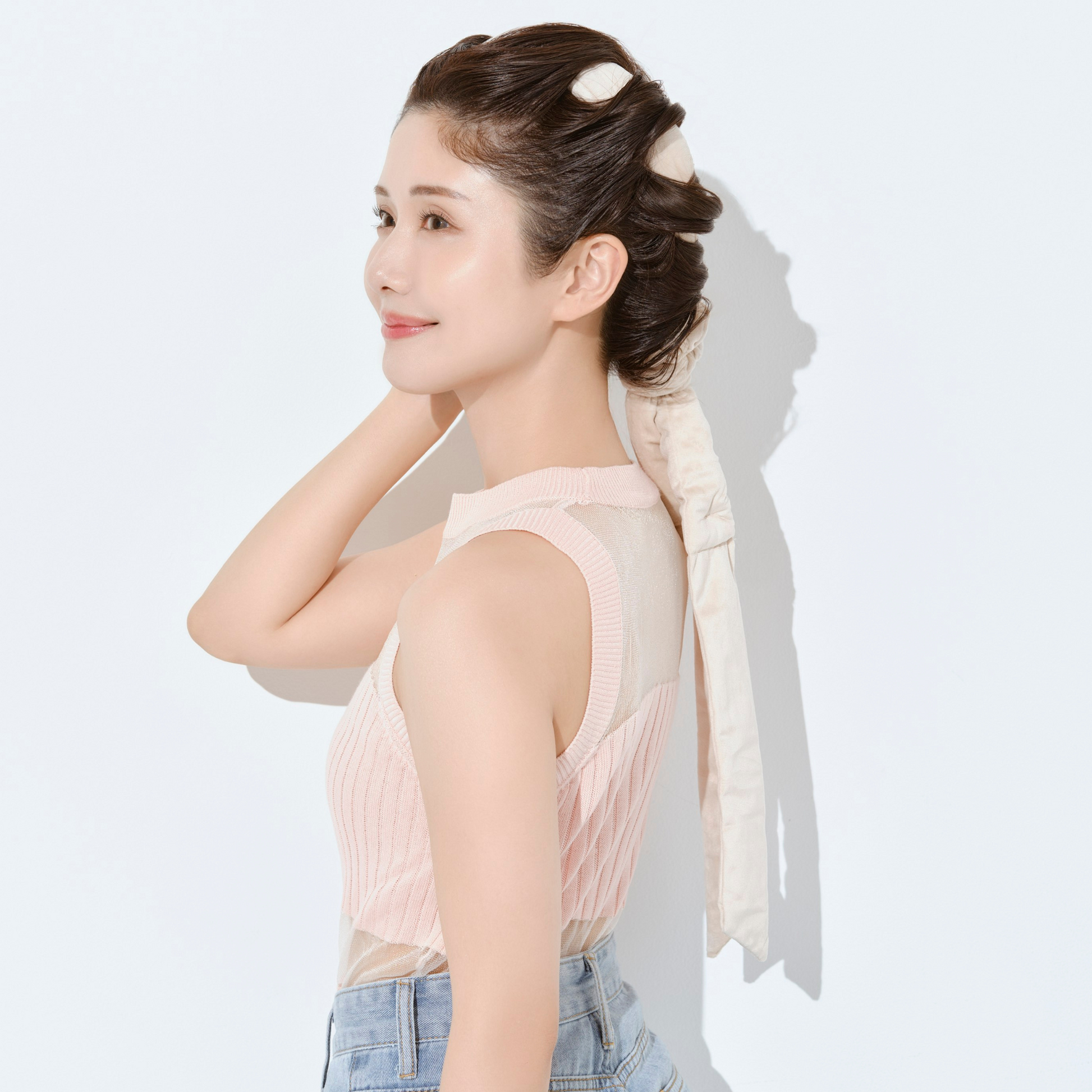 ケアヘアベーシックを付けた女性