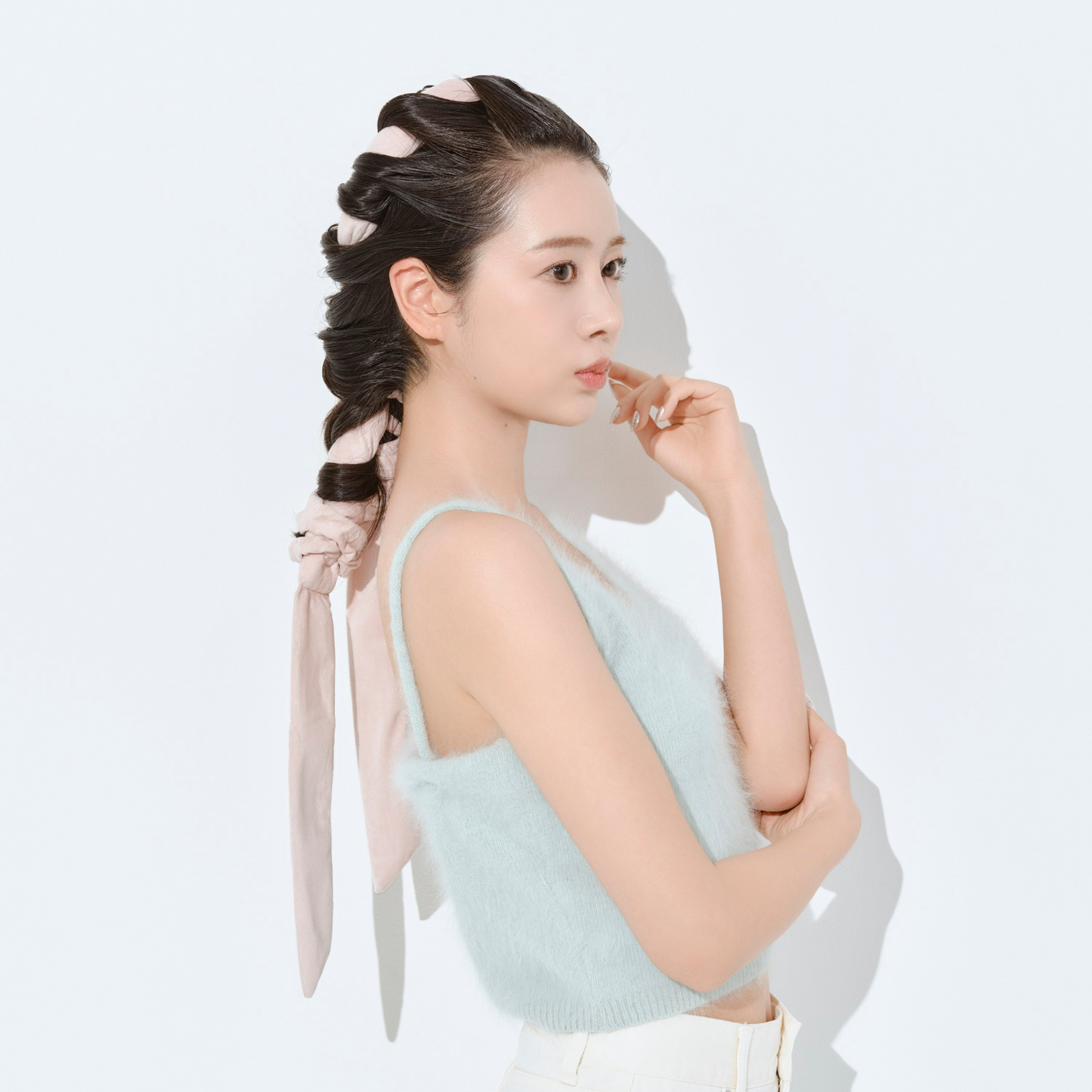 ケアヘアベーシックを付けた女性