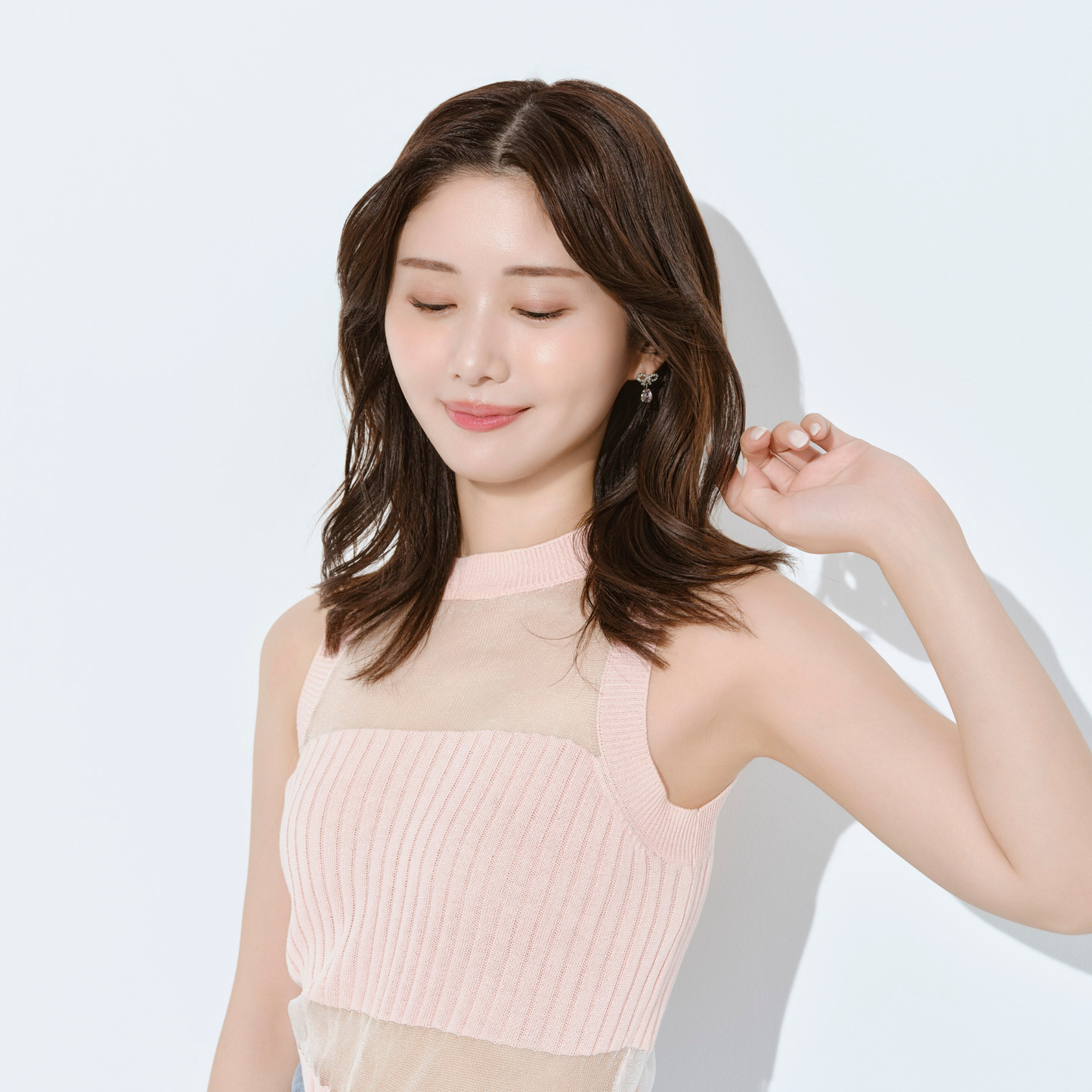 ケアヘアで完成したミディアムヘアの巻き髪